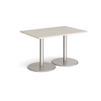 Monza rectangular dining table with flat round bases