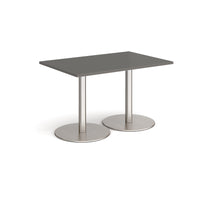 Monza rectangular dining table with flat round bases