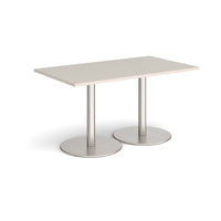 Monza rectangular dining table with flat round bases
