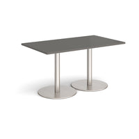 Monza rectangular dining table with flat round bases
