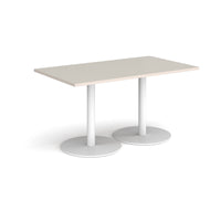 Monza rectangular dining table with flat round bases
