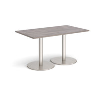 Monza rectangular dining table with flat round bases