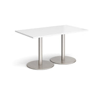 Monza rectangular dining table with flat round bases
