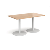 Monza rectangular dining table with flat round bases