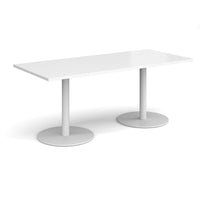 Monza rectangular dining table with flat round bases
