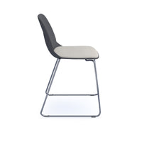 Strut chair with seat pad and chrome sled frame