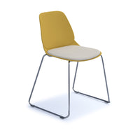 Strut chair with seat pad and chrome sled frame